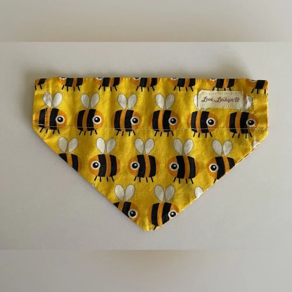 Good used condition. 6 dog bandanas with slit for collar for small dogs.